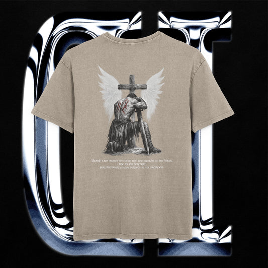 Beige t-shirt with an angel and cross design on a reflective silver background