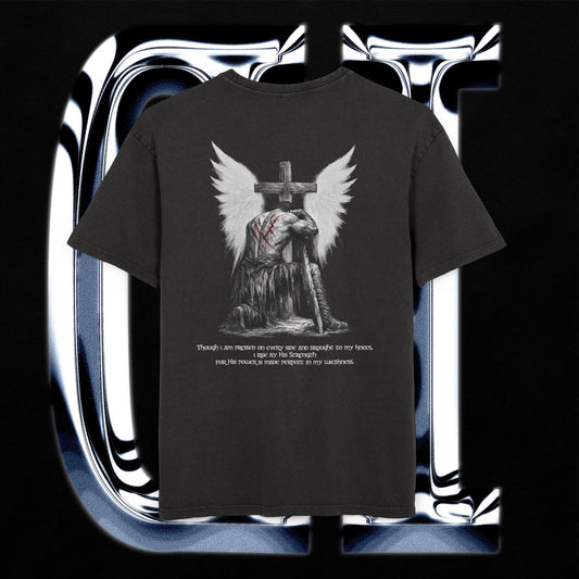 Black t-shirt with an angel holding a cross design on a reflective surface