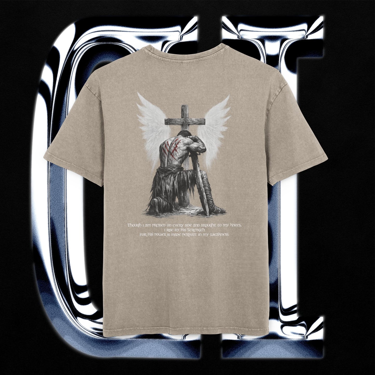 Beige t-shirt with an angel and cross design on a reflective silver background